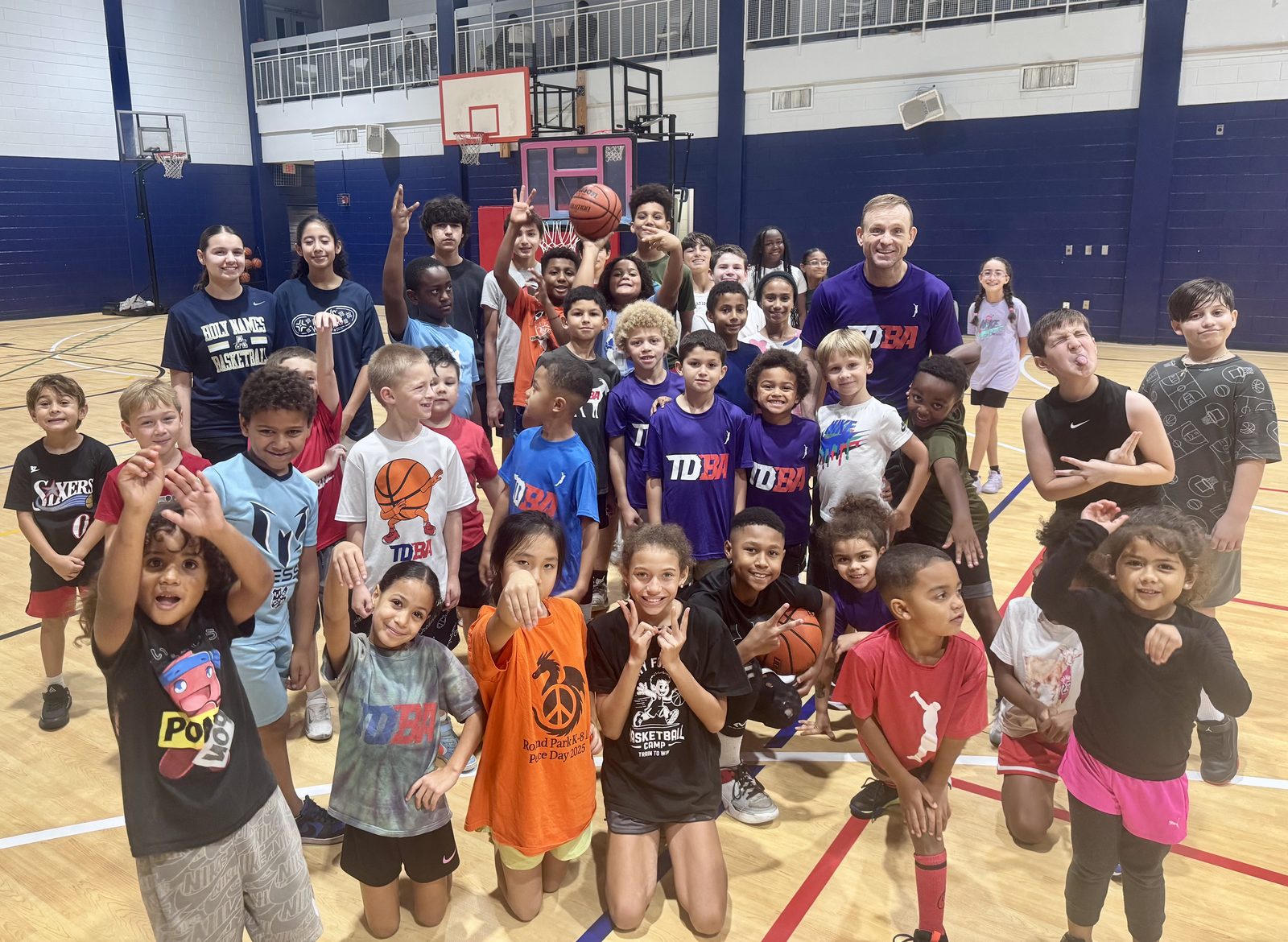 A packed TDBA class with Coach Teddy and players of all ages at the Activities Building
